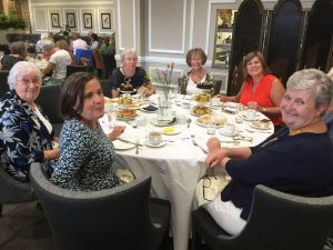 Yorkshire Day Outing to Tenants in Leyburn. Picture shows members of the YCA sat around a table having afternoon tea.